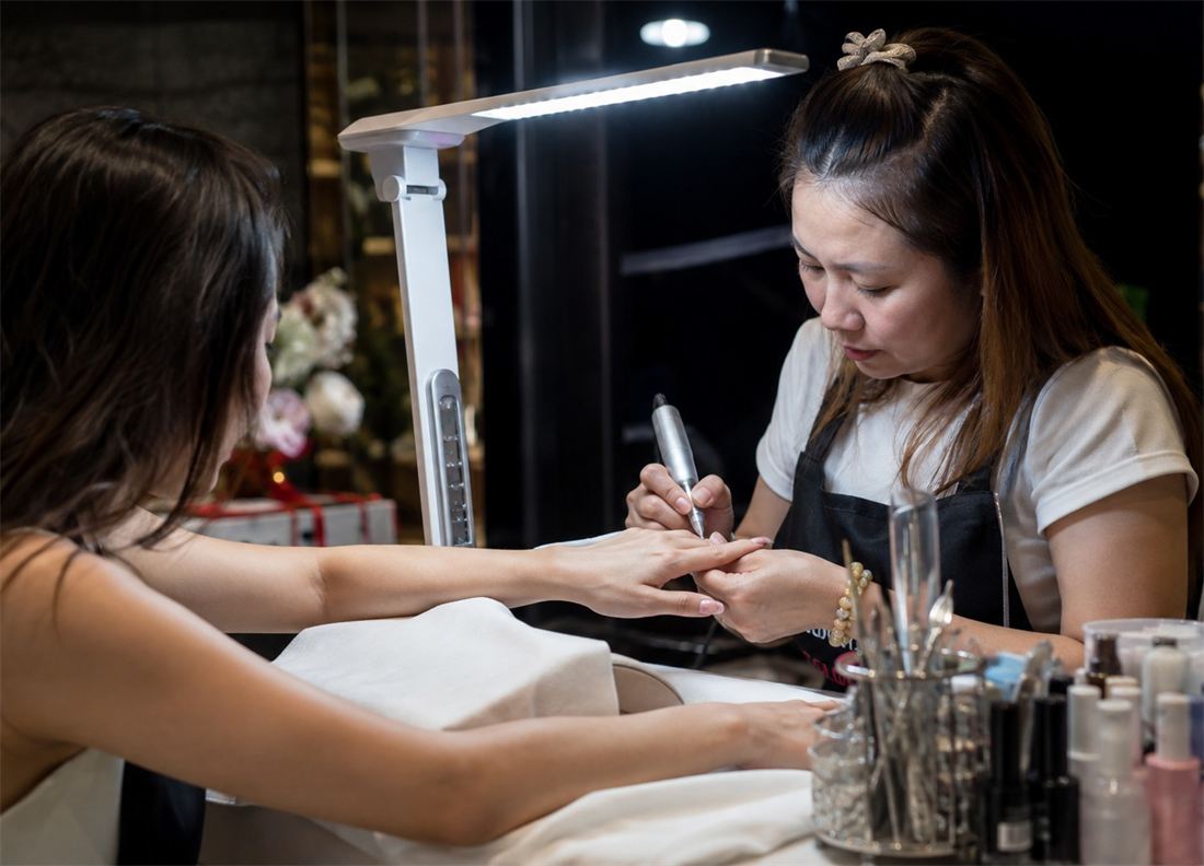 Manicure being performed at home in Thailand